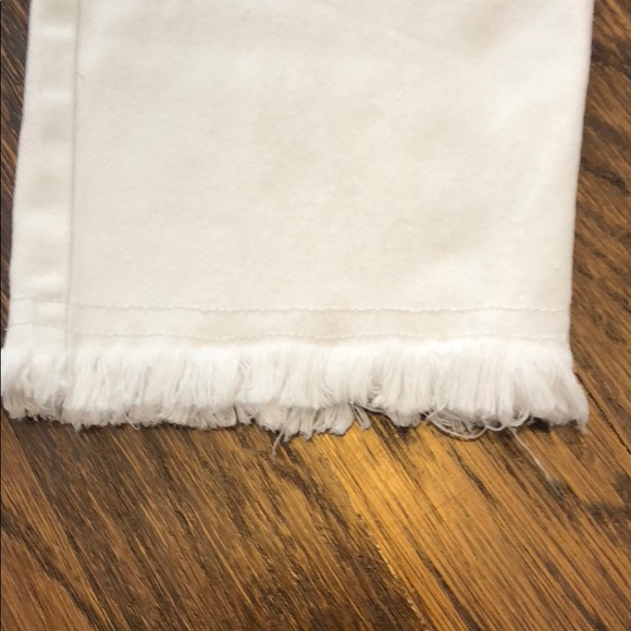 Dior frayed edge white denim jeans